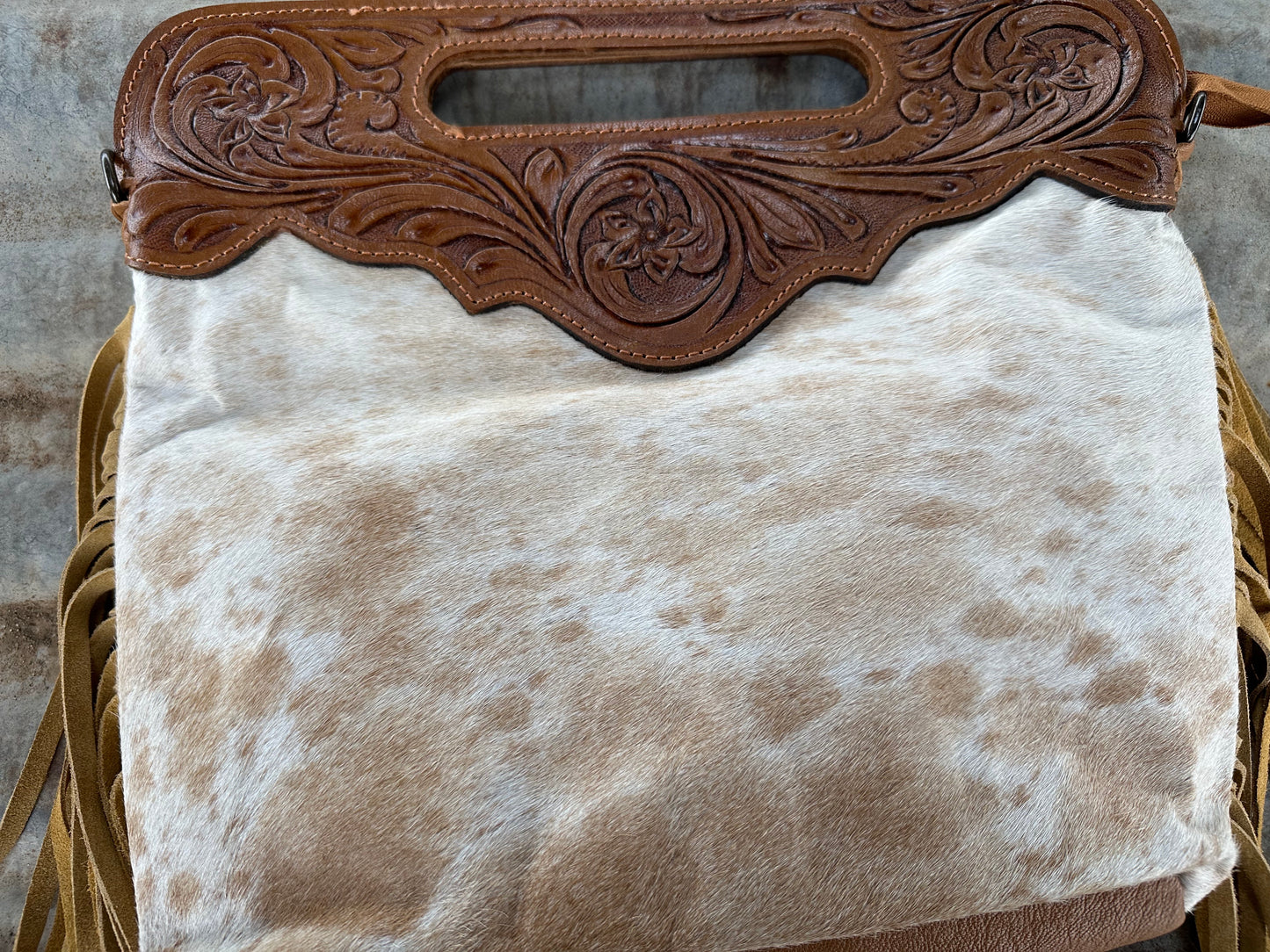 cowhide fringe handbag tooled leather