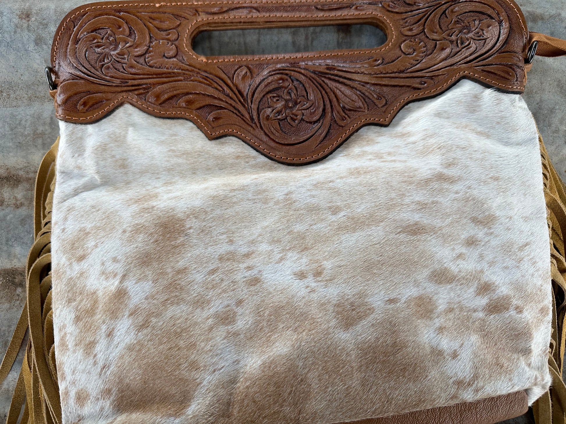 cowhide fringe handbag tooled leather